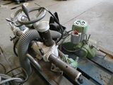a machine that is sitting on a pallet in a garage