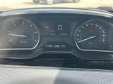 a close up of a car dashboard with a speedometer and gauges