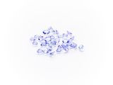 a pile of blue sapphires on a white background