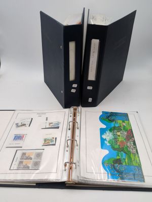 a black binder with a picture of a map inside of it