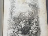 an open book with a drawing of a group of people on it