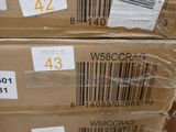 two boxes with a barcode on them are stacked on top of each other