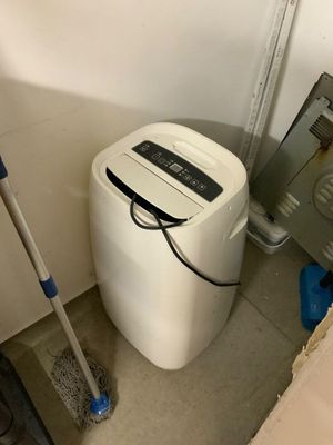 Un climatiseur portable Lieu : SUR DESIGNATION AUCHAN MARTIG…