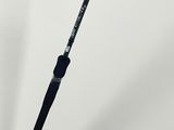 a close up of a fishing rod on a white background