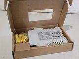 a cardboard box that has a box of electronic equipment inside of it