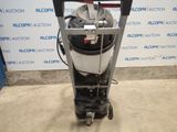 an image of a vacuum cleaner machine in a room