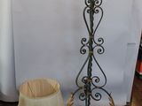 a lamp that is sitting on a table next to a lamp shade