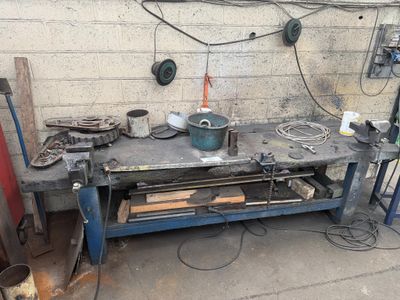 an image of a workbench with a lot of tools on it
