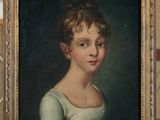 portrait of a young girl in a green dress by person