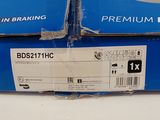 a box of brake discs sitting on a table