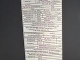 a picture of a receipt on the back of a refrigerator