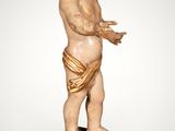 a small statue of a child on a pedestal