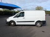 a white van that is parked in a parking lot