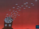 a lot of fish flying in the sky above a building