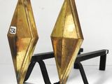 paire de serre-livres Art déco en laiton posés sur un socle en métal noir