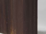 two pieces of chocolate sitting next to each other on top of a table
