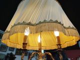 a lamp that is sitting on a table in a room