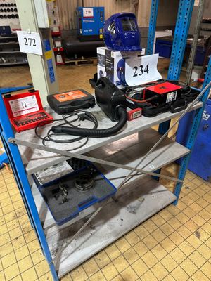 a picture of a work bench with tools on it