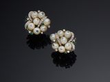 a pair of pearl and diamond ear clips