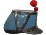 a blue and black hat with a red pom pom on top
