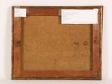an old picture frame with a piece of paper taped to it