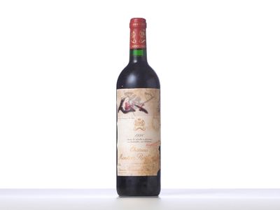 bottle of red wine sitting on a table with a white background