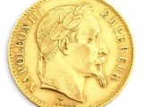 an image of a close up of a gold coin with a man ' s face