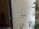 a refrigerator that has been left in the back of a trailer