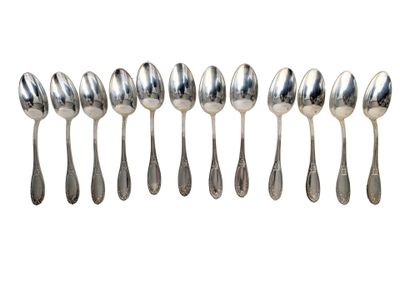 a set of six silver spoons and a spoon with a spoon handle