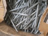 a box full of screws that are in a box