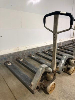 a dolly that is sitting in the middle of a room