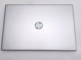 a laptop that is sitting on a white table