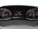 a picture of a dashboard of a car with gauges and numbers