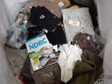 a bag full of clothing and a book in it