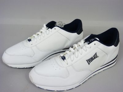 men ' s puma sneakers in white with black trims