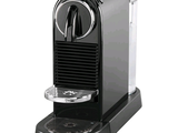 an image of a black coffee machine on a white background