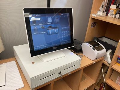 a desktop computer sitting on top of a wooden desk