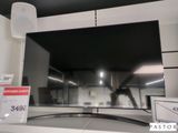 une photo d'un téléviseur à écran plat exposé dans un magasin