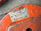 two pipe wrenes that are sitting on the ground