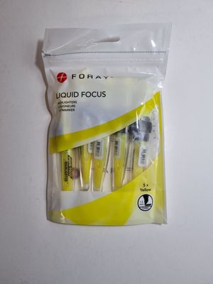 a bag of toothbrushes sitting on a table