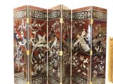 a room divider with a picture of birds and flowers on it