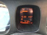 a digital display on the dashboard of a car