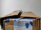 a cardboard box with a broken window on top of it