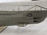 an image of a model of a submarine on a stand