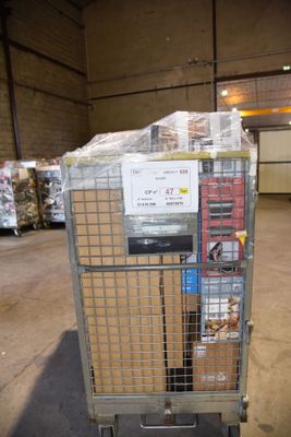a cart with a lot of boxes on it in a warehouse