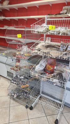many baskets of food on the shelves in the store