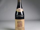 a bottle of wine that is sitting on a table