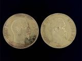 deux pièces d'or représentant une tête d'homme et un visage de femme