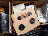 a cardboard box with a bunch of items inside of it