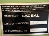 a sign on a machine that says construction